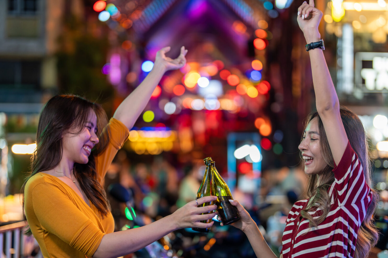 Asian young woman friends hold bottle of beer hav 2024 05 30 20 19 28 utc