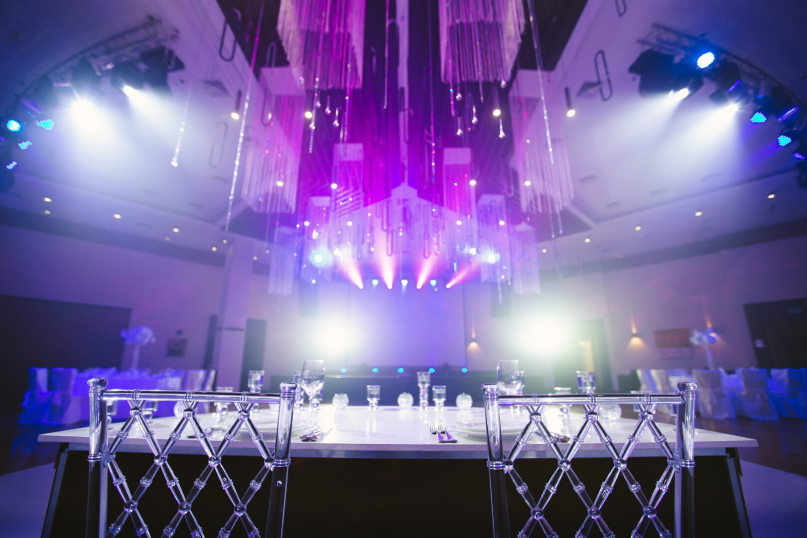 Wedding banquet hall decorated with orchids and crystal